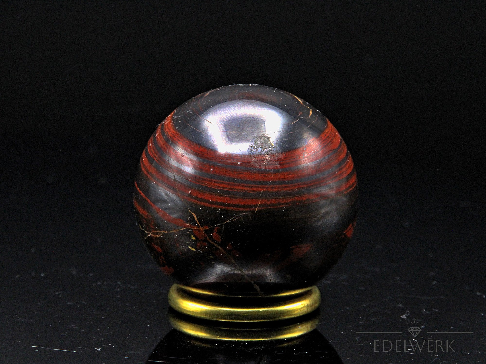 Tigeraugen Kugel Planet, Heilstein für meditative Ruhe, gold-braune Kugelstruktur.