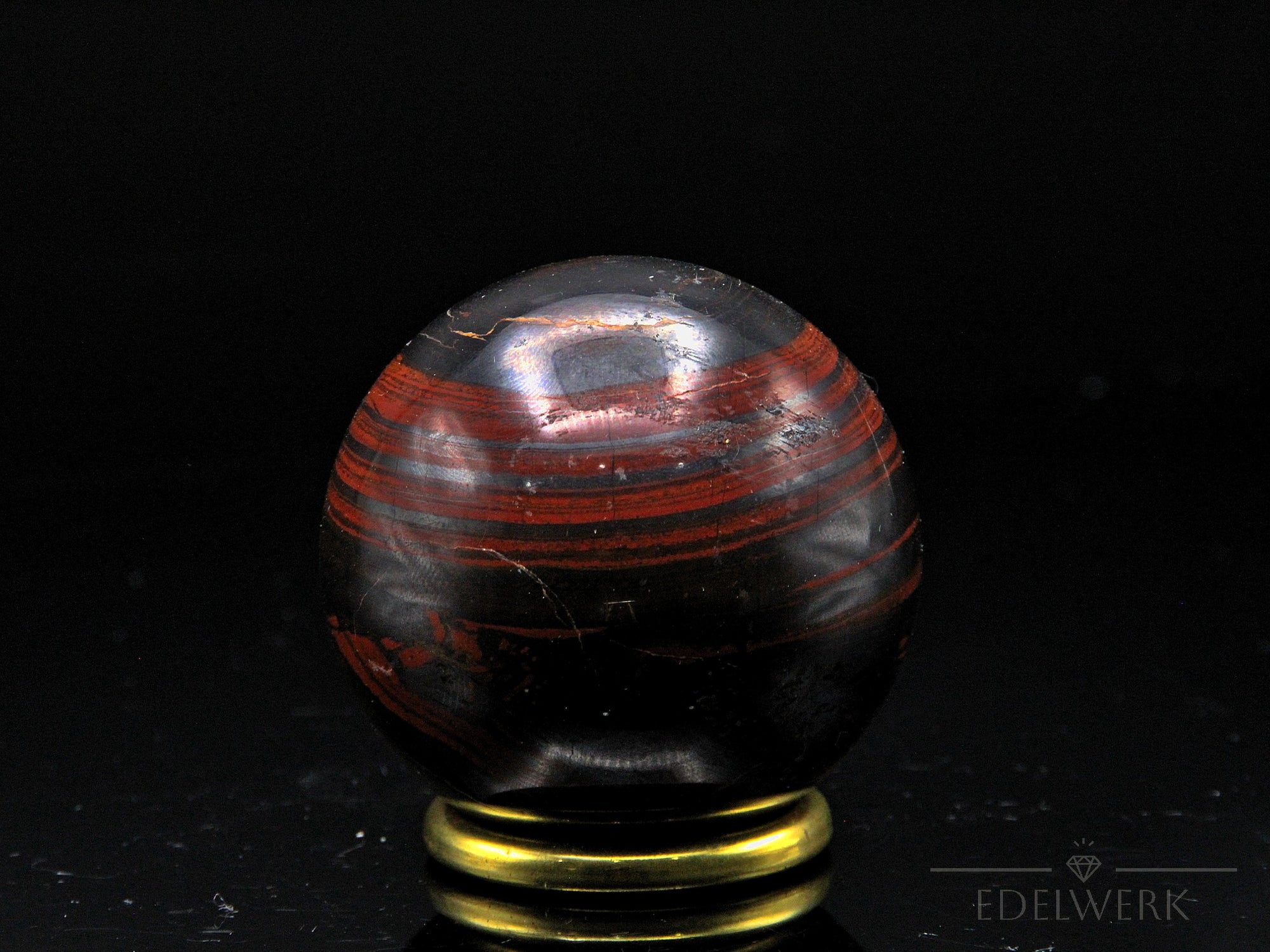 Tigeraugen Kugel Planet, Heilstein für innere Harmonie, glänzende gold-braune Form.